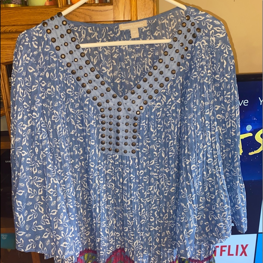 Woman within lightweight blouse